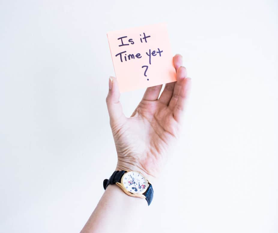 is it time yet hand holding note that says "is it time yet?"