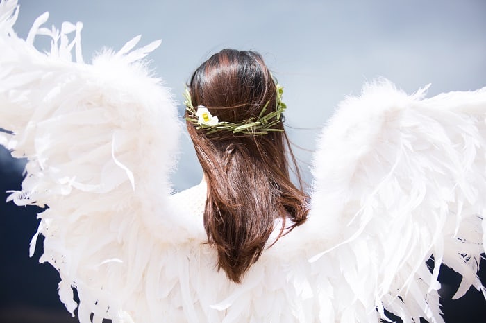 woman dressed as angel