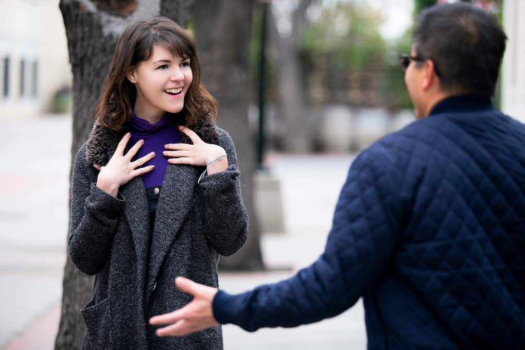 friends bumping into each other on the street