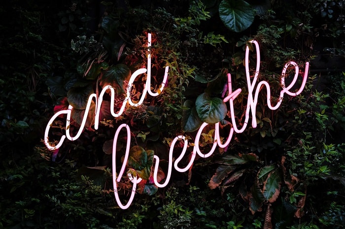 pranayama for stress relief and breathe sign