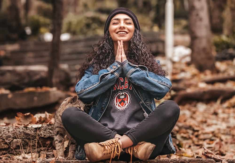 new moon ritual meditation person meditating in nature