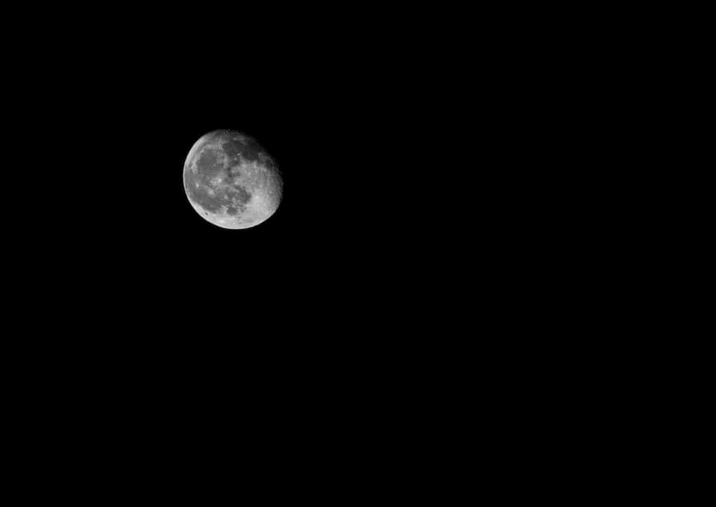 moon phase waning gibbous against night sky