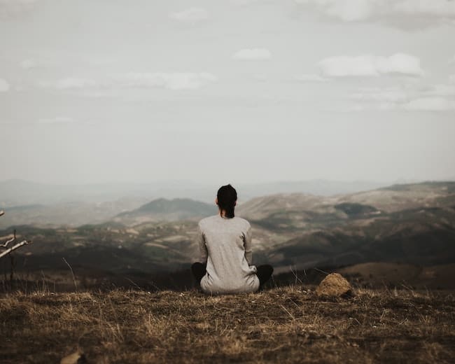 woman sitting in solitude