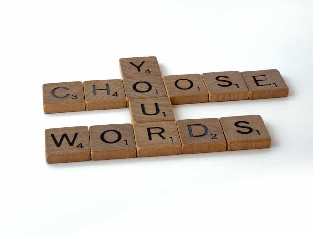84 Positive Sunday Affirmations to Prepare for the Week Ahead 7 scrabble letters arranged to read "you choose your words"