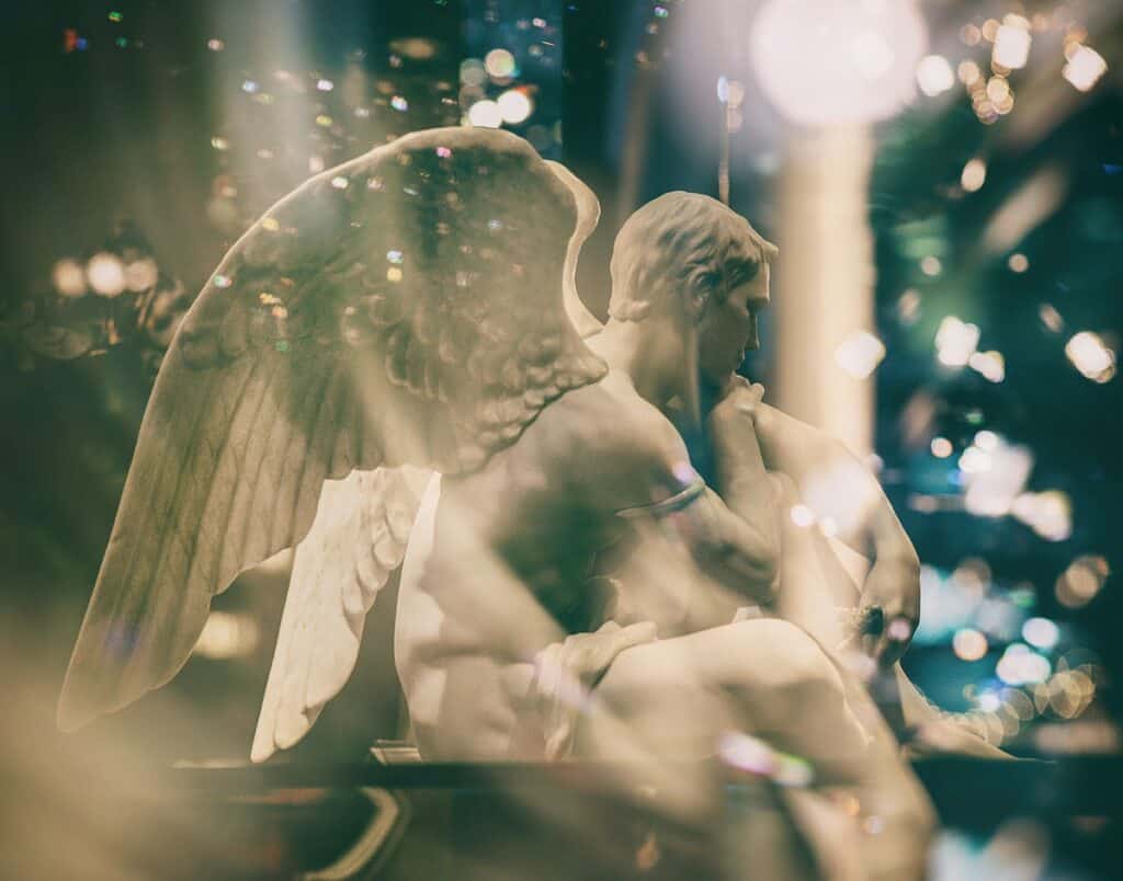 The 14 Best Angel Cards Decks for Healing in 2024 5 statue of archangel with light falling on it