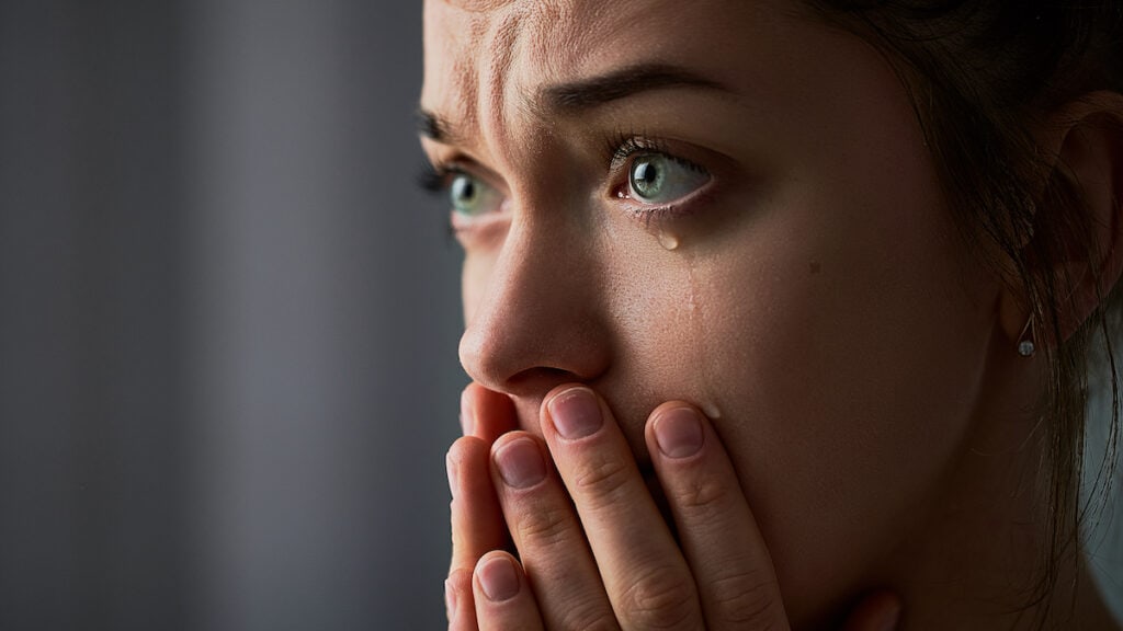 22 Simple Ways to Practice Emotional Self Care 6 close up of woman crying, tears falling down cheeks