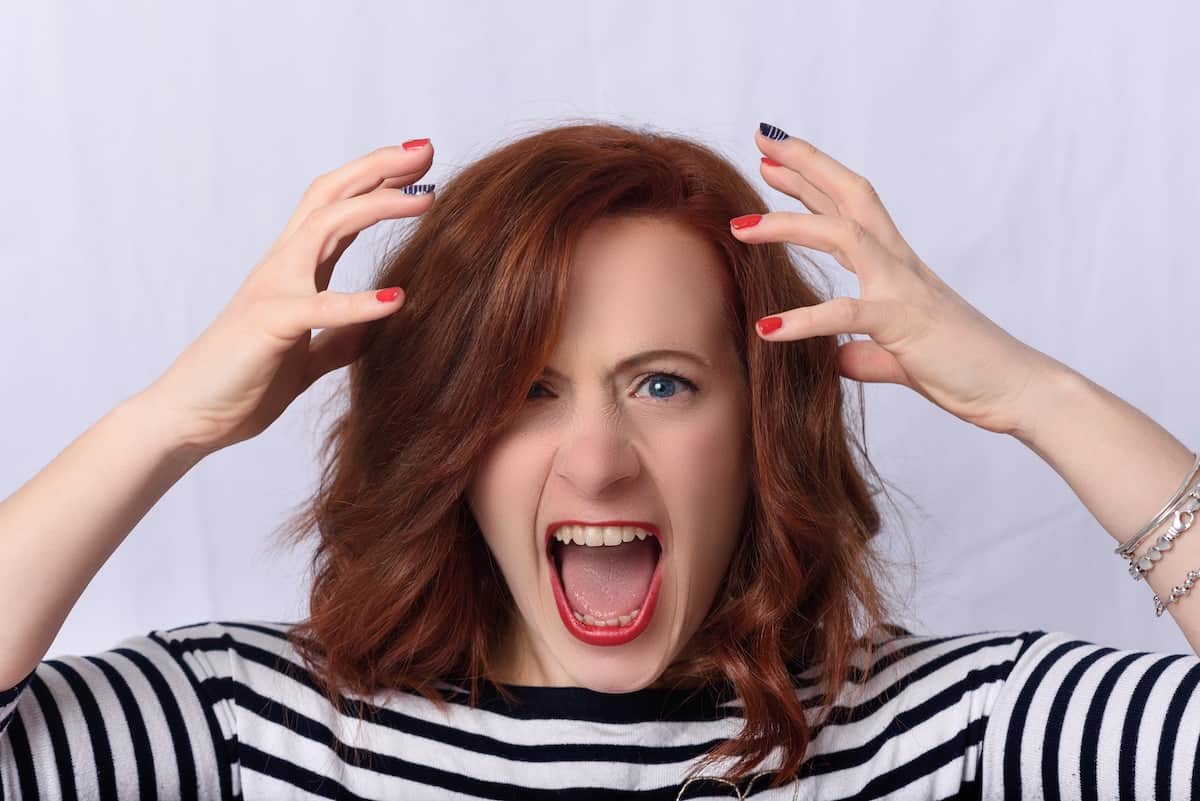 How to JournalSpeak: Journaling for Chronic Symptoms 15 woman expressing rage with her facial expression