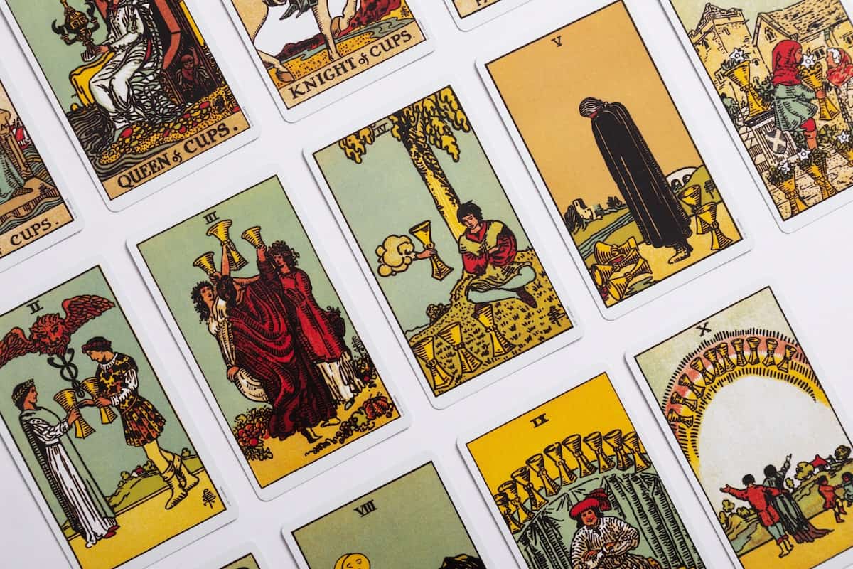 78 Positive Daily Tarot Affirmations for your Deck 5 tarot cards placed in grid formation on table