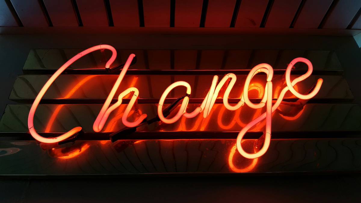 neon sign of the word "change"